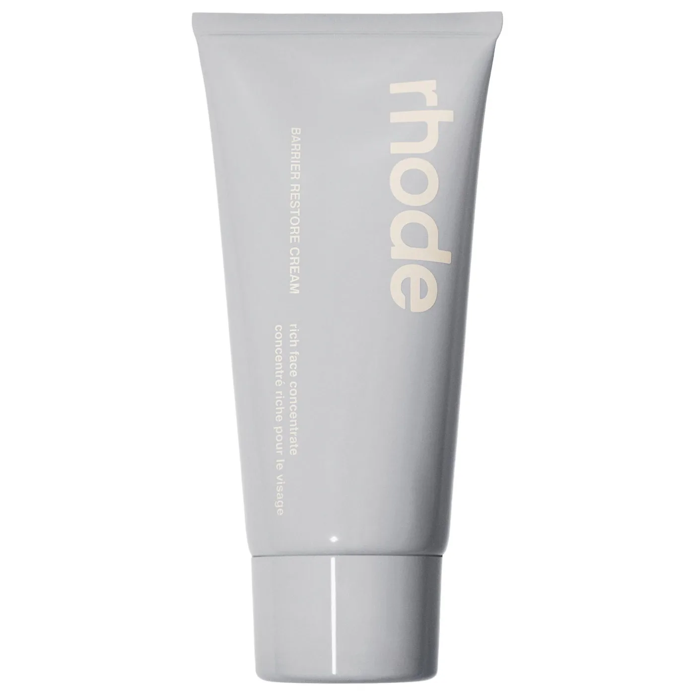 Pomo de Rhode Barrier Restore Cream sobre fondo claro
